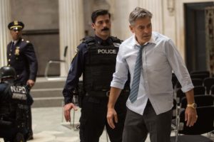George Clooney (Lee Gates, right) stars with Giancarlo Esposito (Captain Marcus Powell, left) and Anthony DeSando (Officer Benson, center) in TriStar Pictures' MONEY MONSTER.